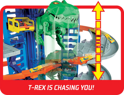 Hot Wheels City Ultimate Garage Playset with multi-level racetrack and moving T-Rex, featuring two toy cars and parking for 100.