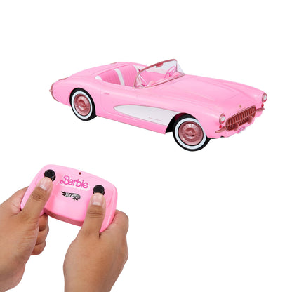 Barbie Corvette remote control car holds 2 dolls, features an opening trunk for storage, and is battery-operated.