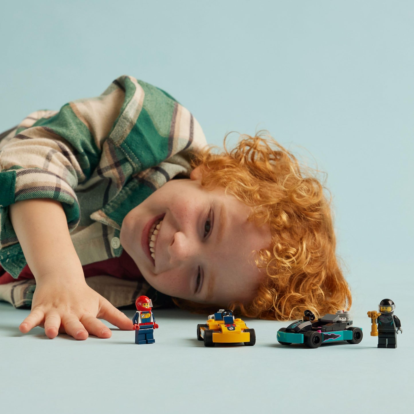 LEGO City Go-Karts playset featuring two driver minifigures and colorful racing vehicles for creative play.