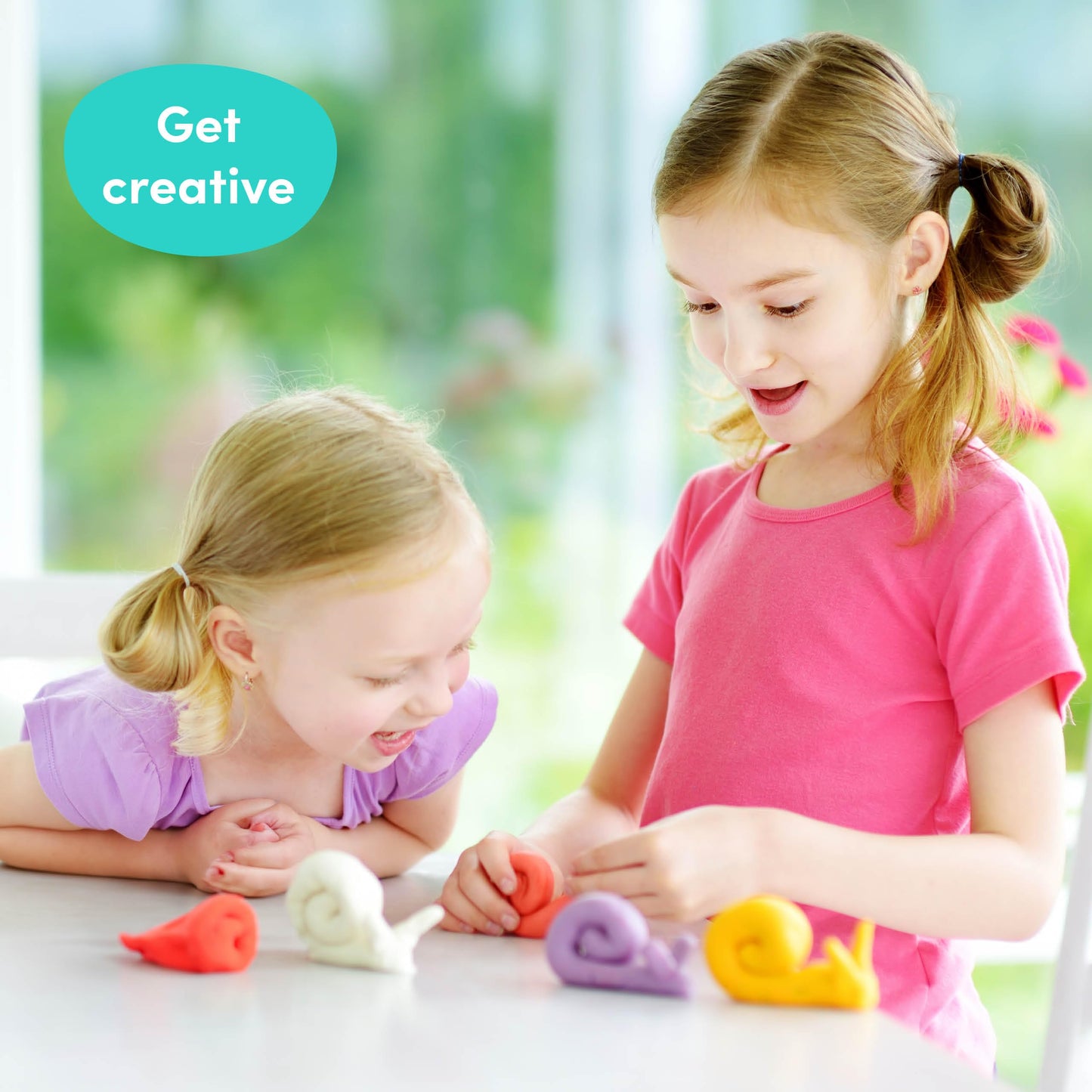 Colorful bouncing slime putty tubs by THE TWIDDLERS, perfect for kids' party favors and fidget toys in bright, vibrant colors.