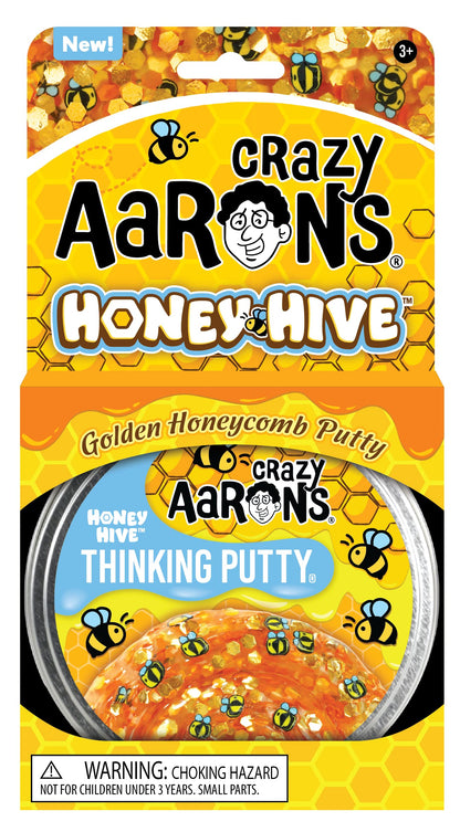 Crazy Aaron's Trendsetters Honey Hive clear putty with hidden pieces, non-toxic slime that never dries out, perfect for creative play.