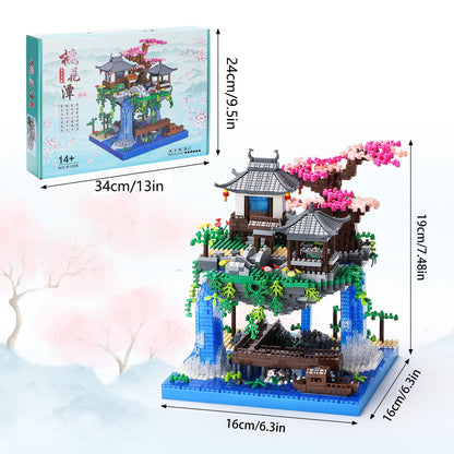 CAXIMSY Cherry Blossom Bonsai Treehouse building block set with 3300 pieces, featuring intricate architecture and mini tree design.
