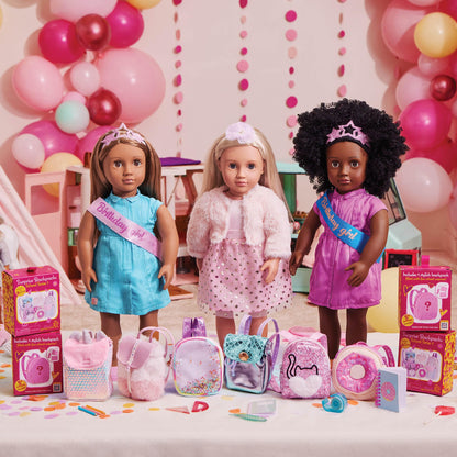18-inch Our Generation doll Khelani dressed for a birthday party with colorful accessories and a festive outfit.