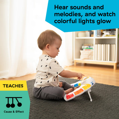 Baby Einstein Glow & Discover Light Bar musical activity station with colorful lights and buttons for sensory play and tummy time.