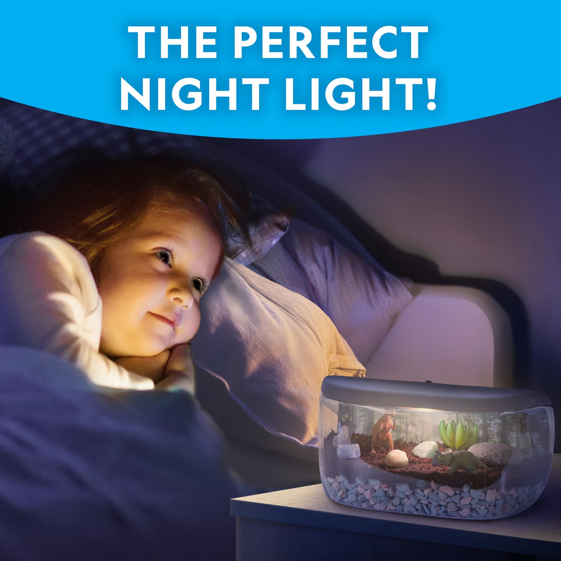 Blue Marble National Geographic Light Up Terrarium Kit for Kids featuring dinosaur toys, real plants, gemstones, and building materials.