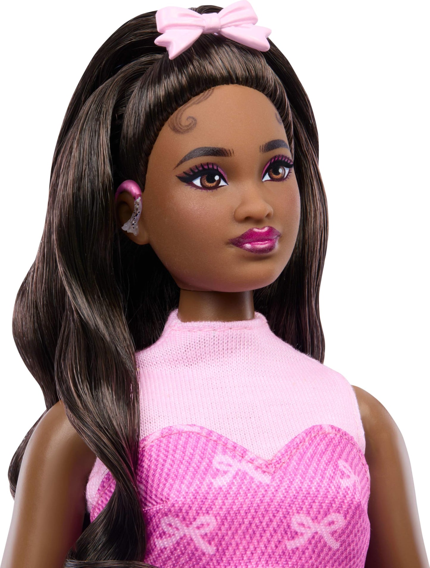 Barbie Deluxe Style Doll #10 in pink denim outfit with bow print, black hair, hearing aids, and handbag accessories.