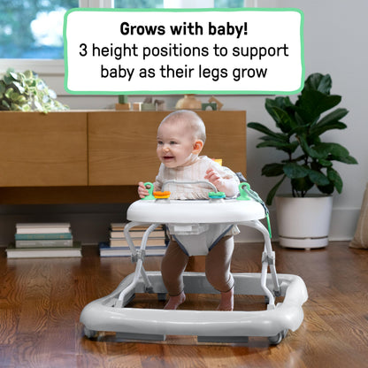 Ingenuity Smooth Strides activity walker in chambray with toys, 3-position height adjustment for babies 6-12 months.