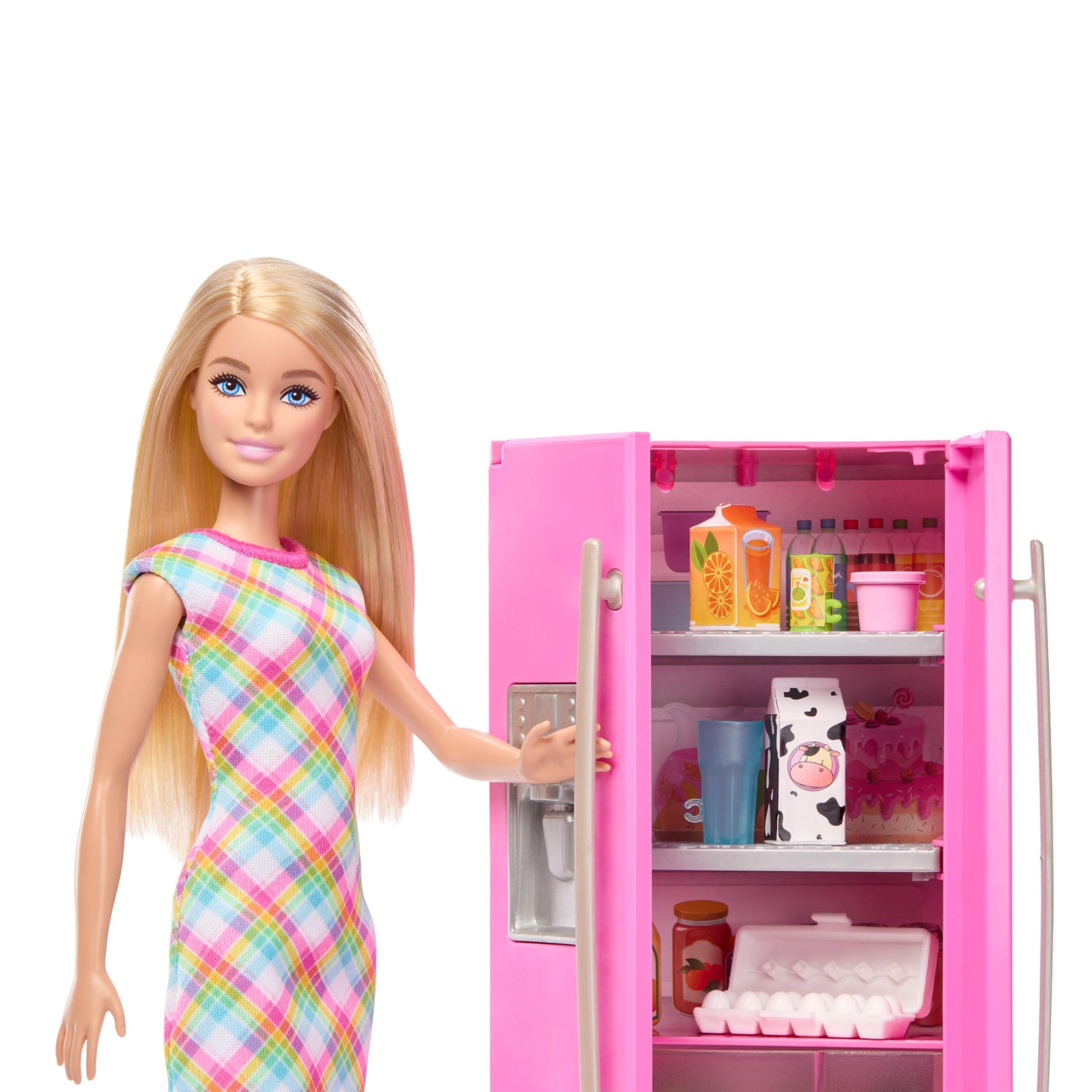 Barbie doll and kitchen playset with refrigerator, food accessories, sticker sheet, and 10 additional play items.