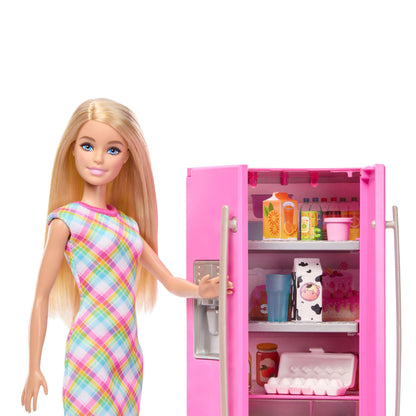 Barbie doll and kitchen playset with refrigerator, food accessories, sticker sheet, and 10 additional play items.