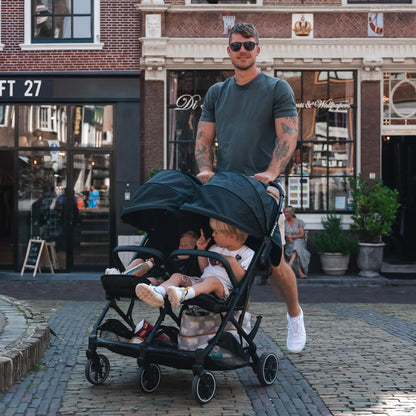 Deryan Rolo X2 pushchair in black, 2-in-1 pram and buggy for birth to 4 years, compact, foldable, with 44 kg weight limit.