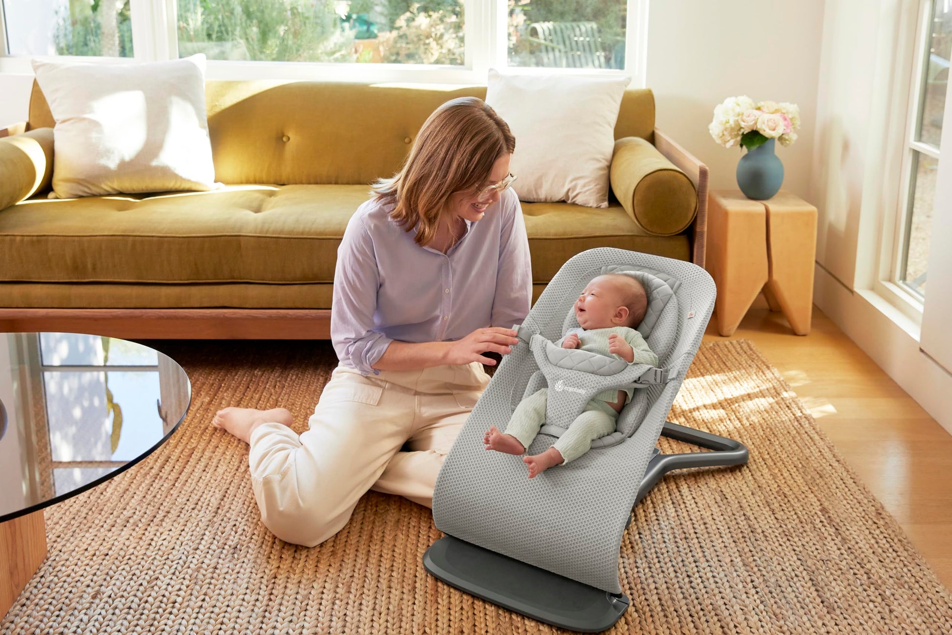 Ergobaby 3-in-1 Evolve Bouncer Mesh in light grey, ergonomic baby rocker with breathable mesh and newborn insert for infants.