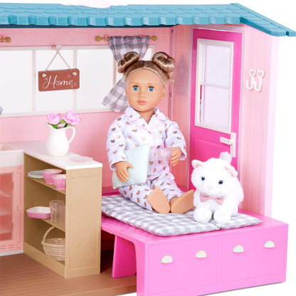 Our Generation dollhouse playset featuring furniture, play food, and animal sounds for 18-inch dolls in a country house setting.