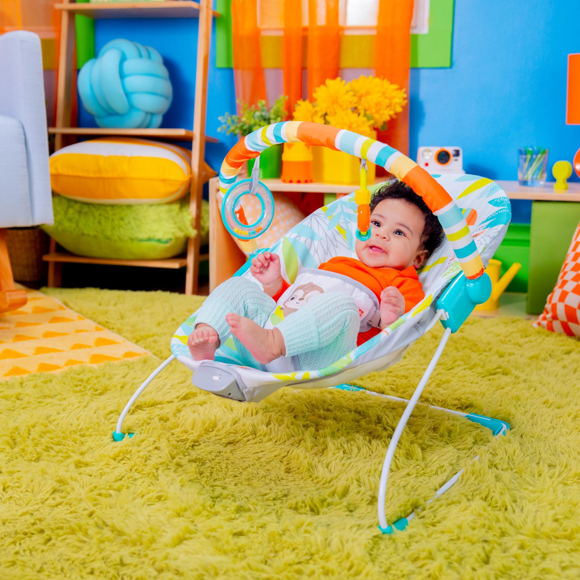 Bright Starts baby bouncer seat with rainforest design, removable toy bar, nonslip feet, suitable for infants 0-6 months up to 20 lbs.