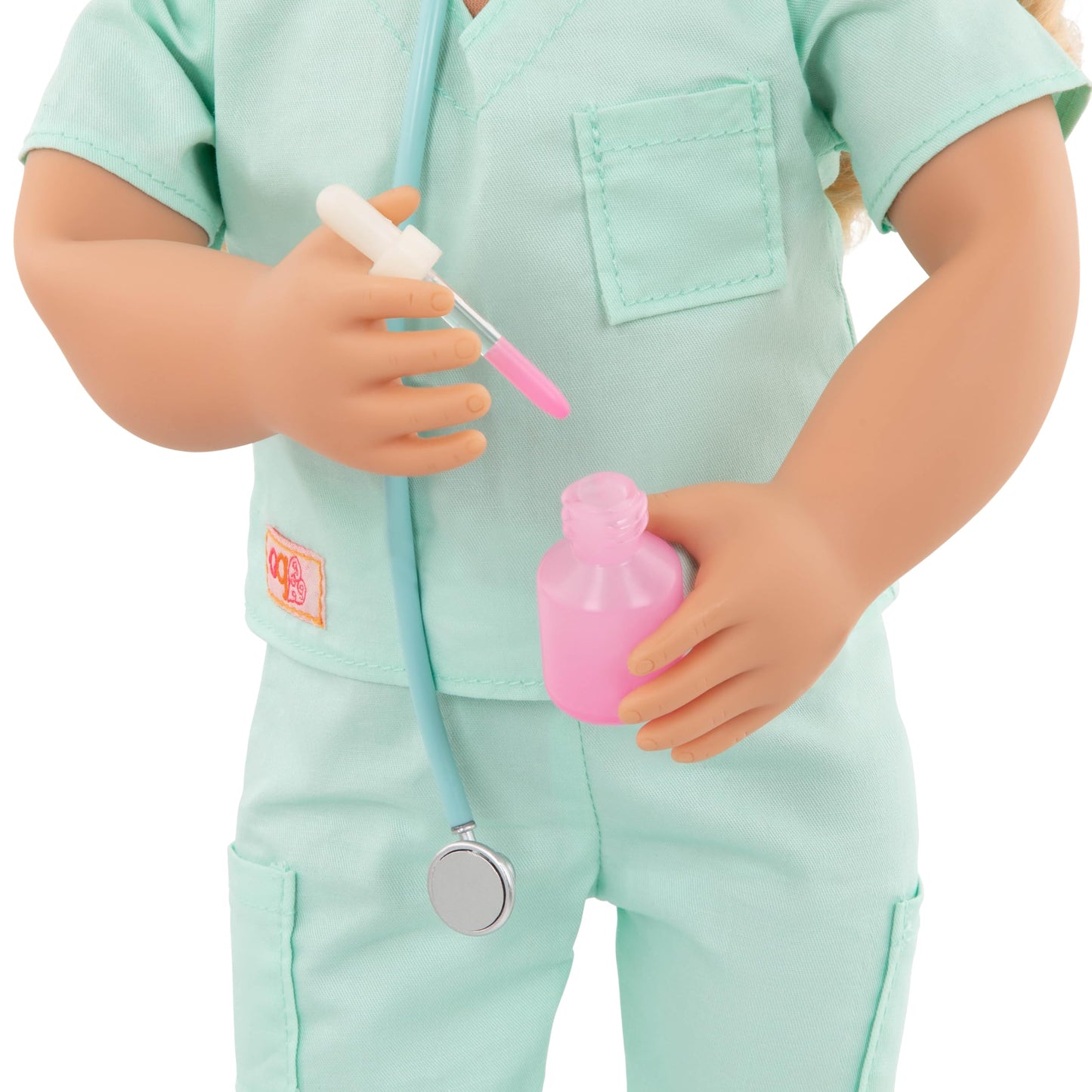Our Generation doll hospital bed set with medical gown, stethoscope, and accessories for 18-inch dolls.
