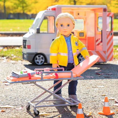 Our Generation Medi-Care Set with stretcher and medical accessories for 18-inch dolls and pretend play hospital fun.