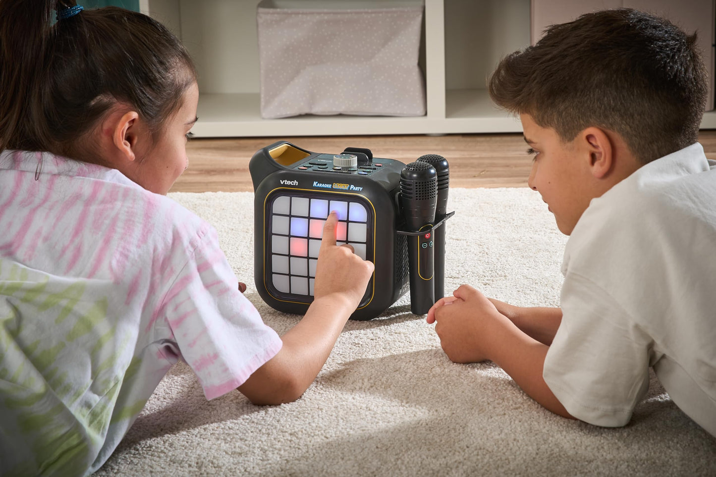 VTech Karaoke Light Party machine with two wireless microphones, Bluetooth speaker, colorful light show, and built-in games.