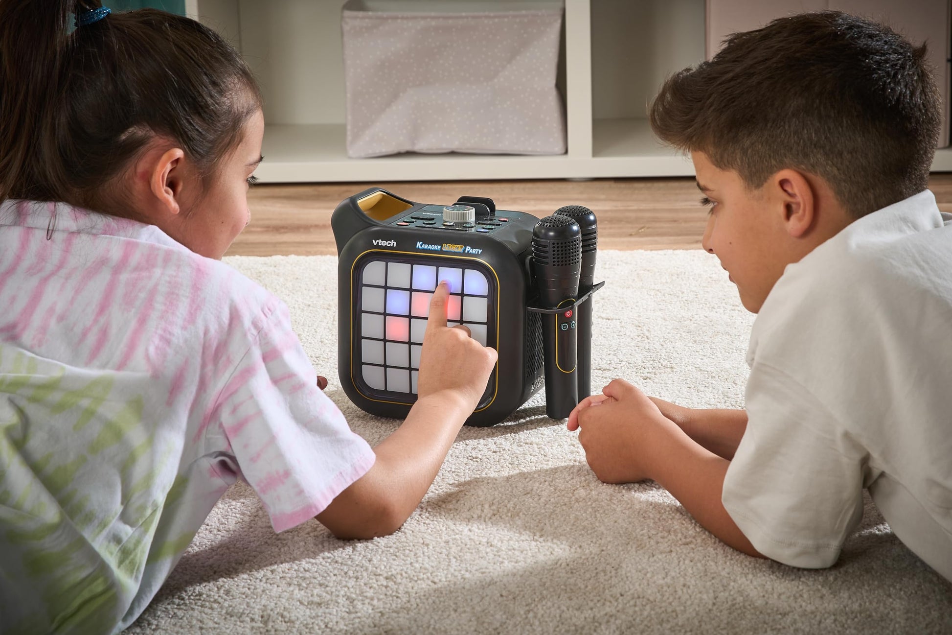 VTech Karaoke Light Party machine with two wireless microphones, Bluetooth speaker, colorful light show, and built-in games.