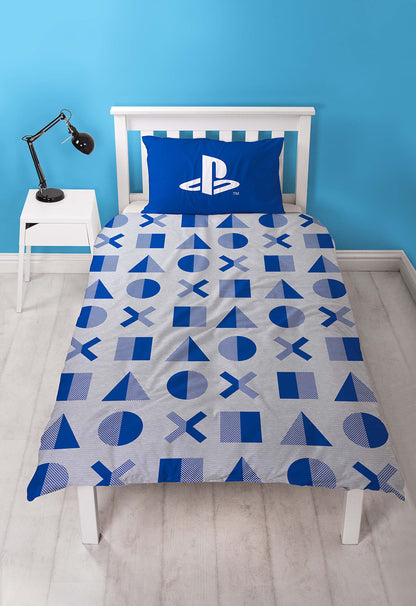 Reversible PlayStation Official duvet cover with layered design and pillow case, featuring gaming-themed graphics on both sides.