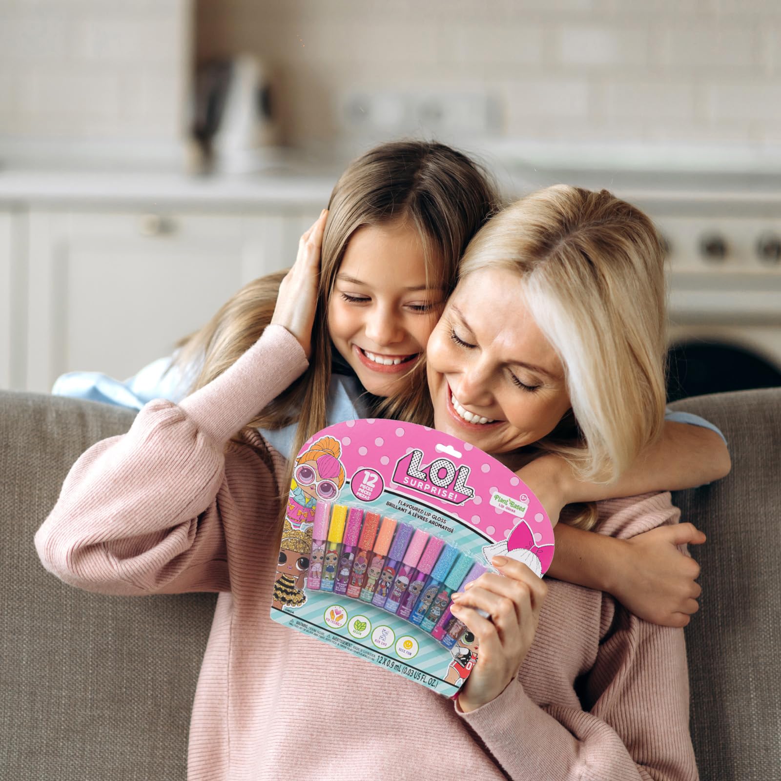 L.O.L. Surprise 12-piece plant-based lip gloss set by Townley Girl, featuring colorful tubes for girls' parties and sleepovers.