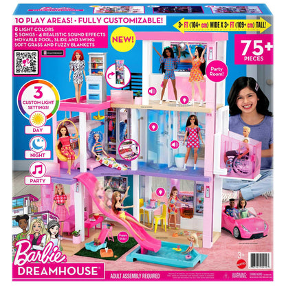 Barbie DreamHouse dollhouse with colorful rooms, wheelchair accessible elevator, lighting, music, and over 75 accessories inside.