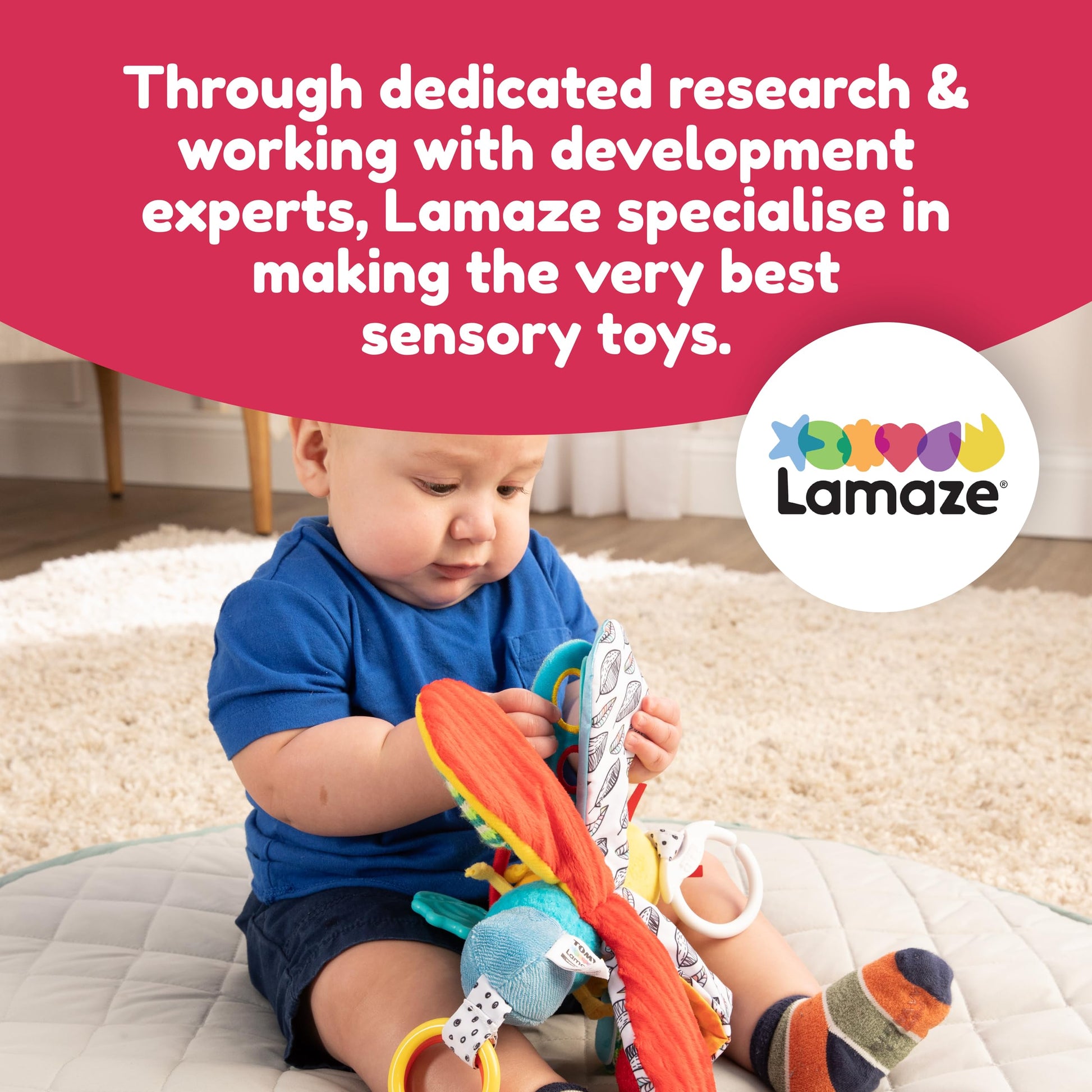 LAMAZE Freddie the Firefly clip-on baby toy attached to a stroller, sensory toy for newborns 0-6 months, colorful and soft.