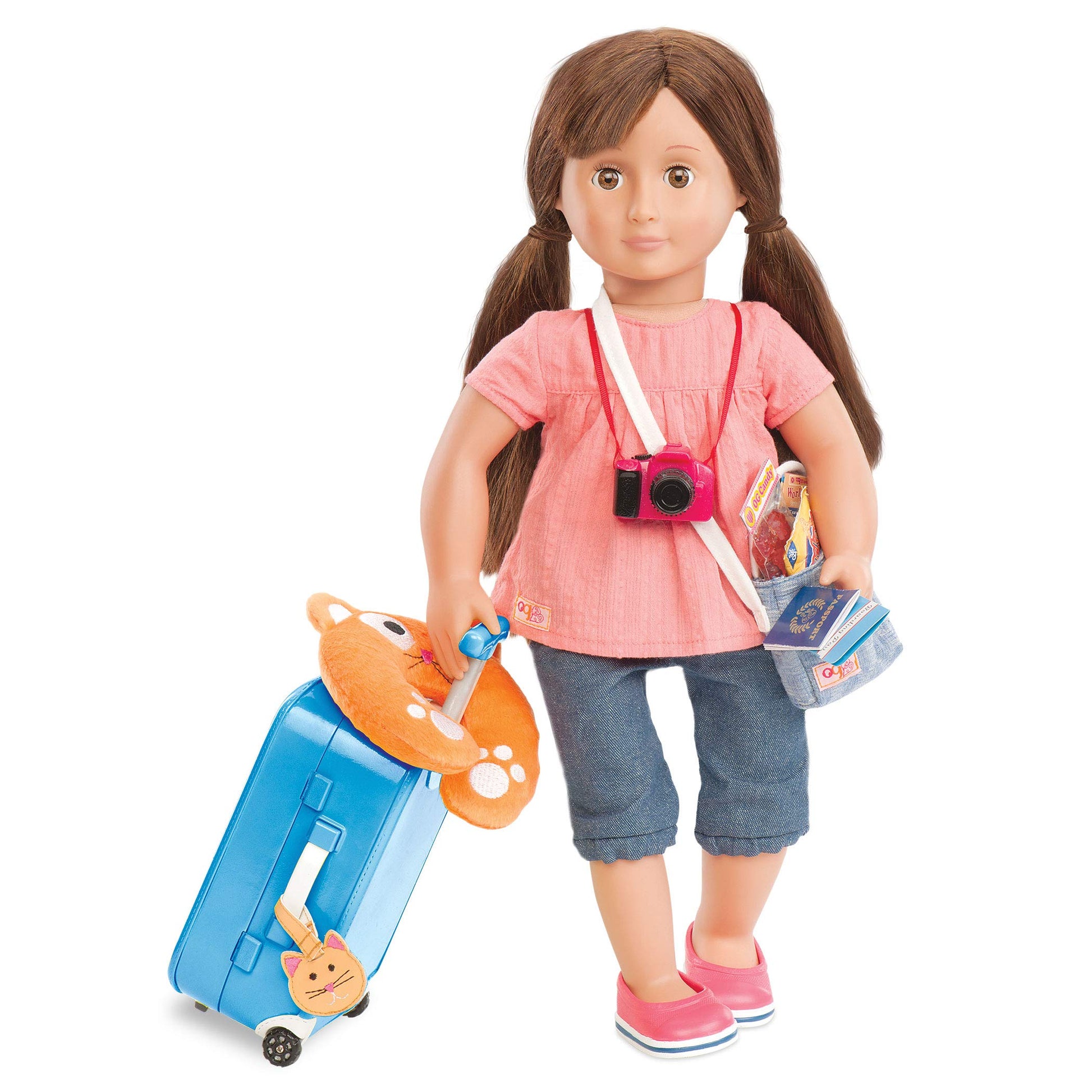 Our Generation Well Travelled Luggage Set for dolls, featuring various colorful bags and travel accessories.