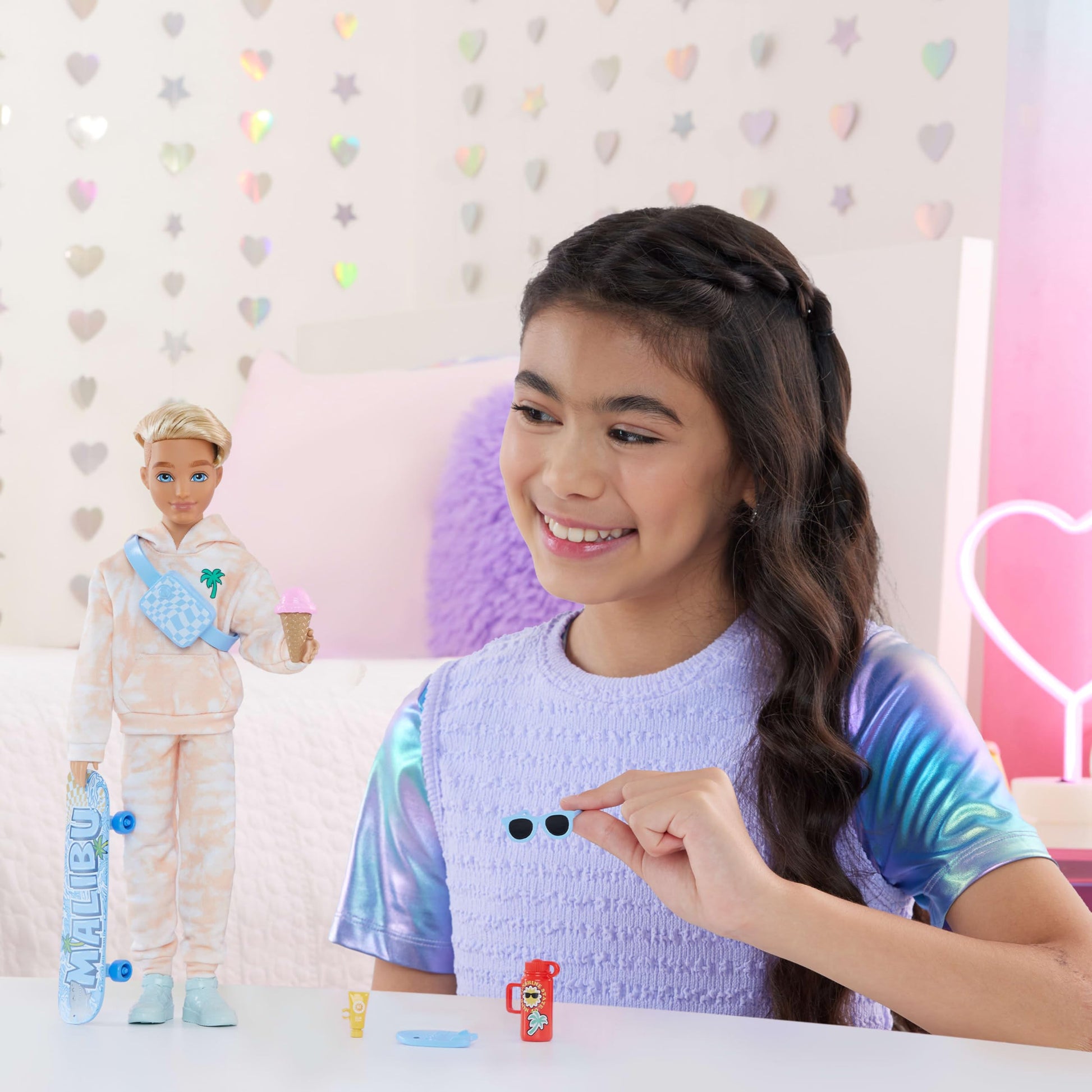 Barbie Dream Besties doll and accessories featuring Ken poseable fashion doll with blonde hair, skateboard-themed pieces, and removable fashions.