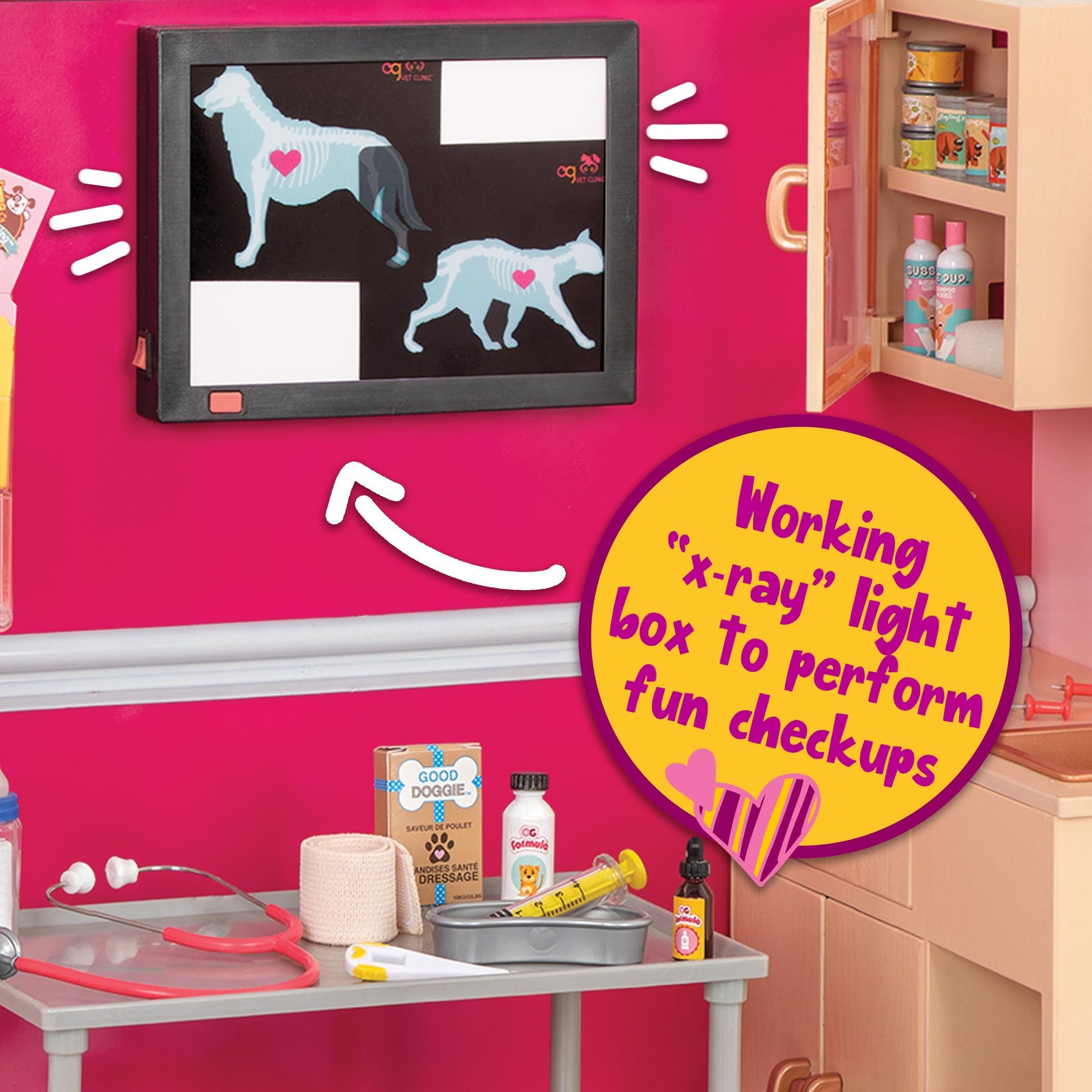 Our Generation Healthy Paws Vet Clinic playset for 18-inch dolls, featuring a pink veterinary clinic and accessories.