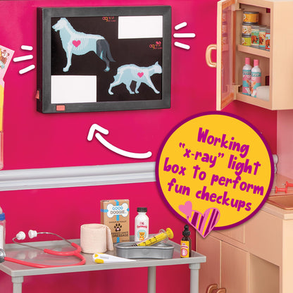 Our Generation Healthy Paws Vet Clinic playset for 18-inch dolls, featuring a pink veterinary clinic and accessories.