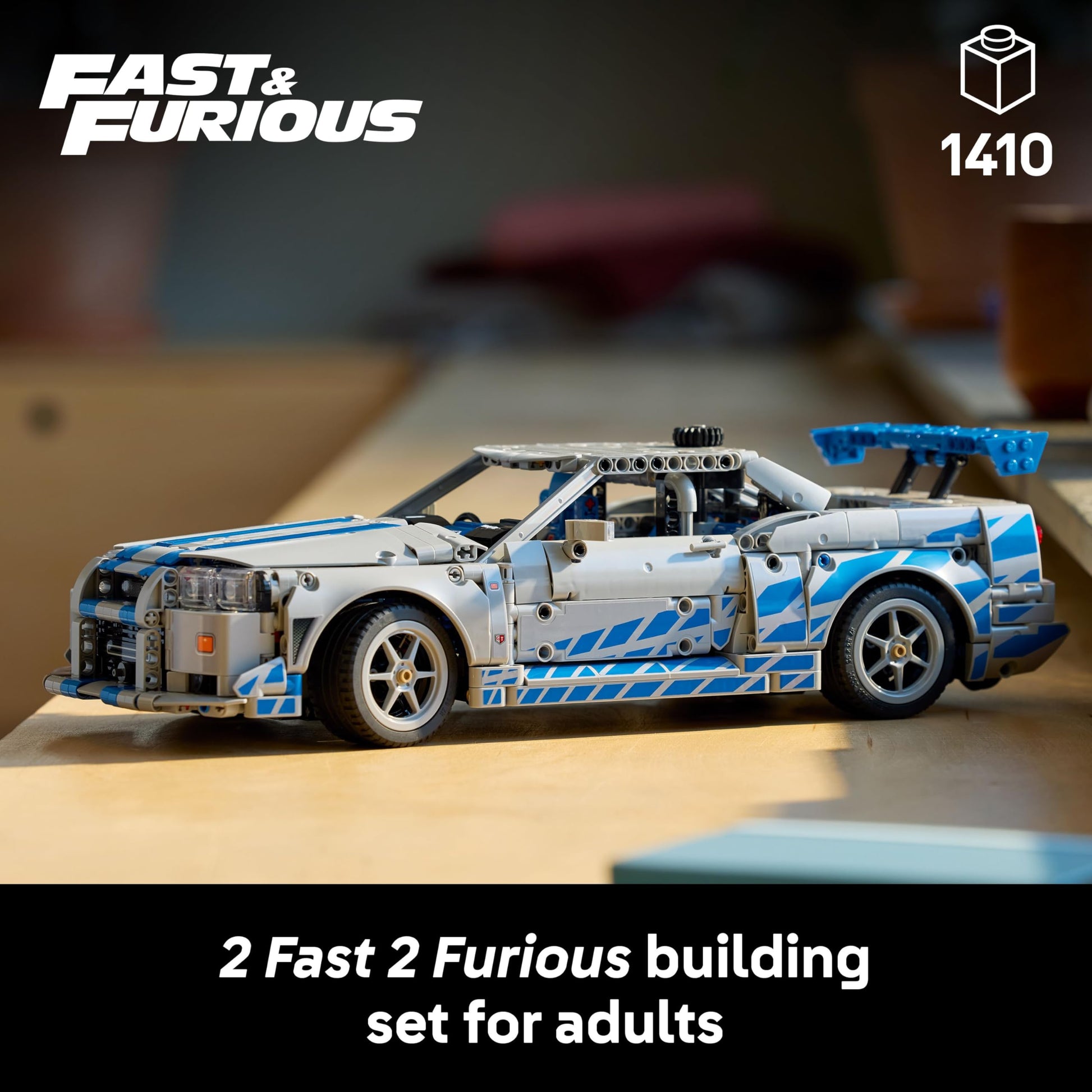 LEGO Technic 2 Fast 2 Furious Nissan Skyline GT-R model kit with drift function, steering, and detailed 6-cylinder engine.