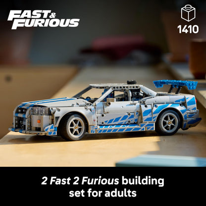 LEGO Technic 2 Fast 2 Furious Nissan Skyline GT-R model kit with drift function, steering, and detailed 6-cylinder engine.