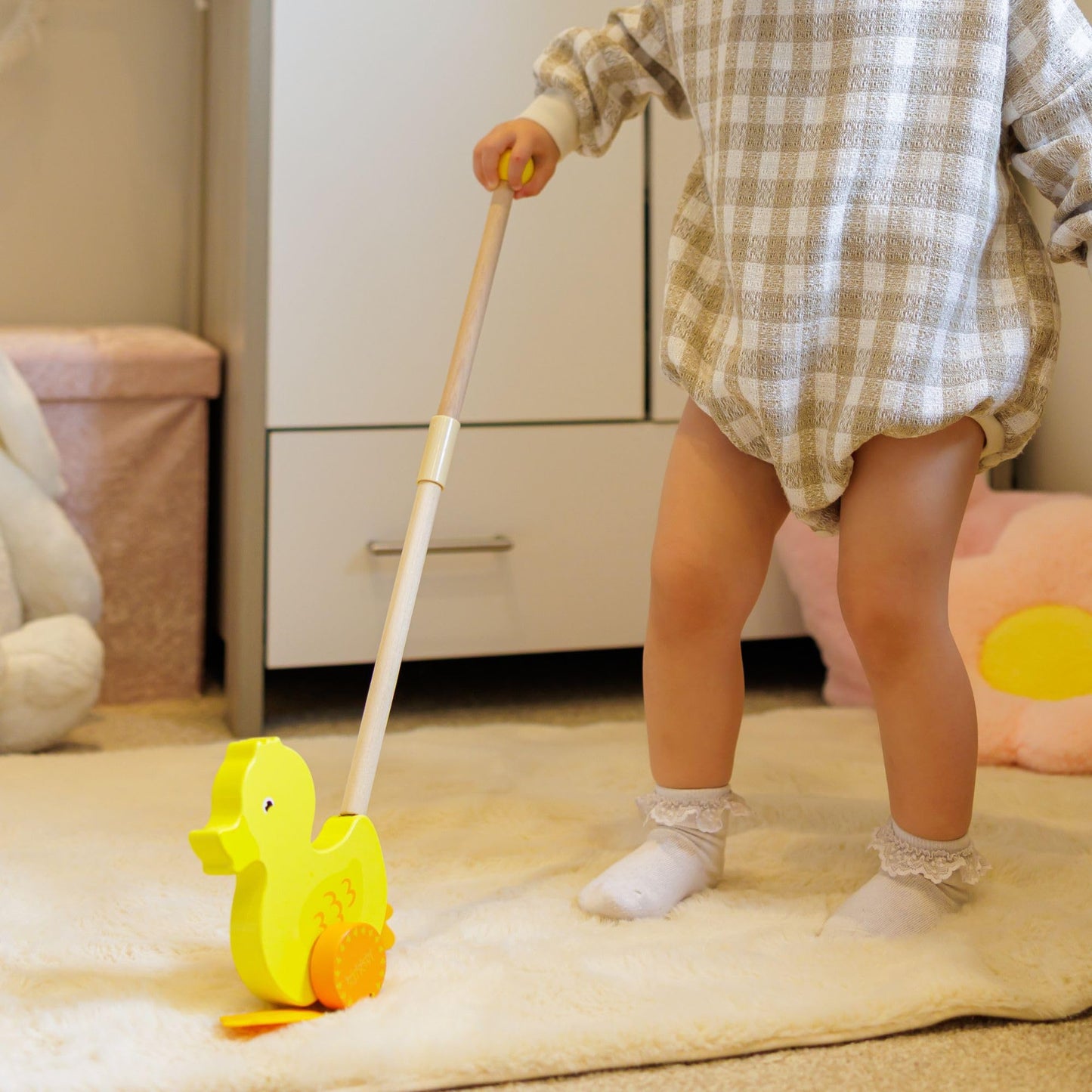 Jaques of London Waddles the Duck wooden push toy for toddlers, featuring a classic wooden duck design for 1-year-olds.