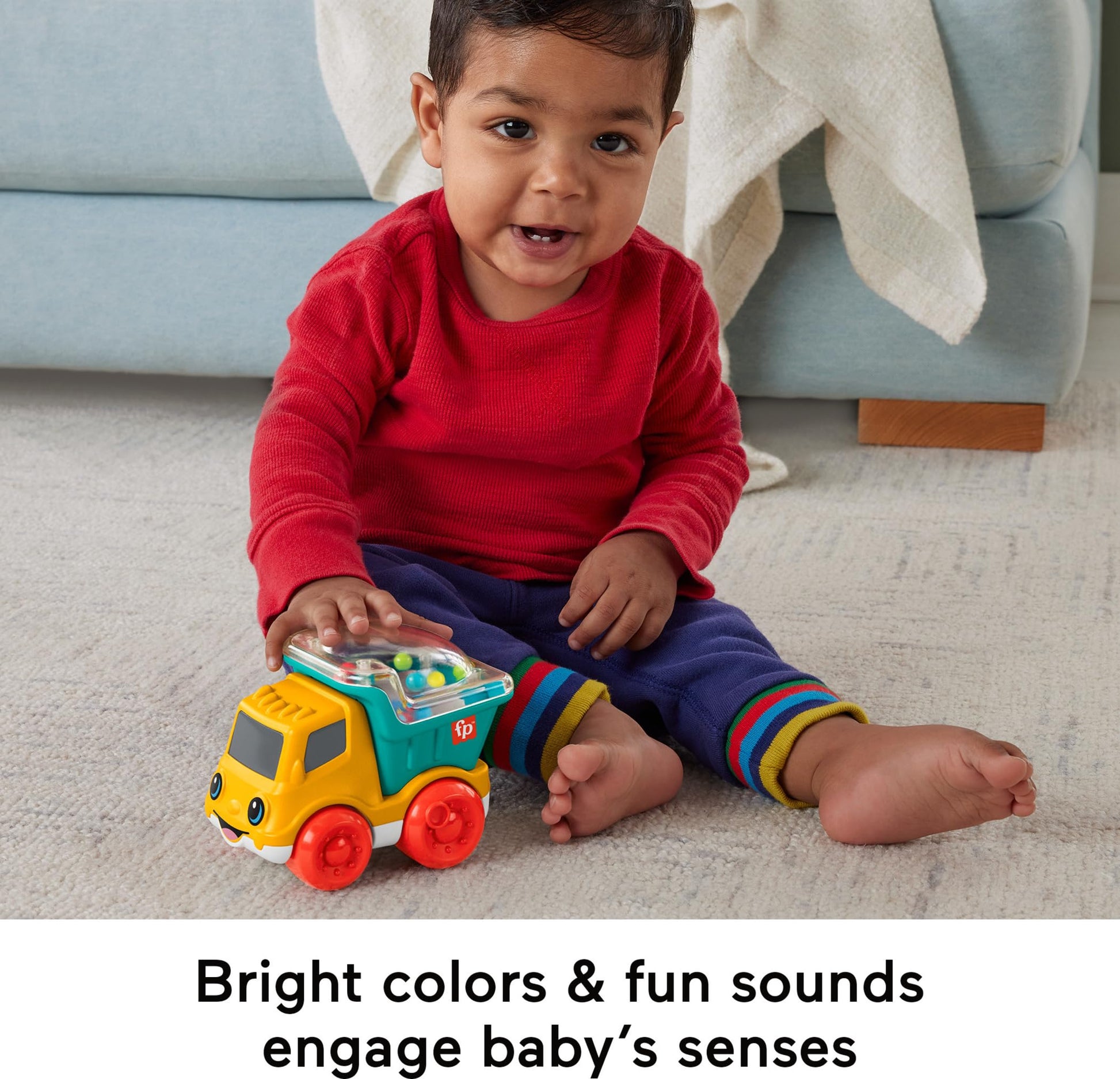 Colorful Fisher-Price Poppity Pop Dump Truck with bright red body, yellow bed, and playful design for kids.