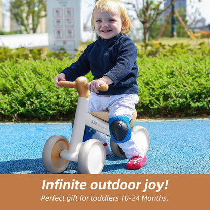 Brown XJD baby balance bike for toddlers, designed for 10-24 months, featuring no pedals and a sturdy construction.