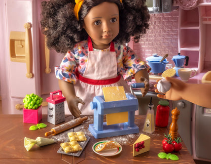 Our Generation pink fridge and kitchen playset with cooking accessories for 18-inch dolls, perfect for imaginative play.