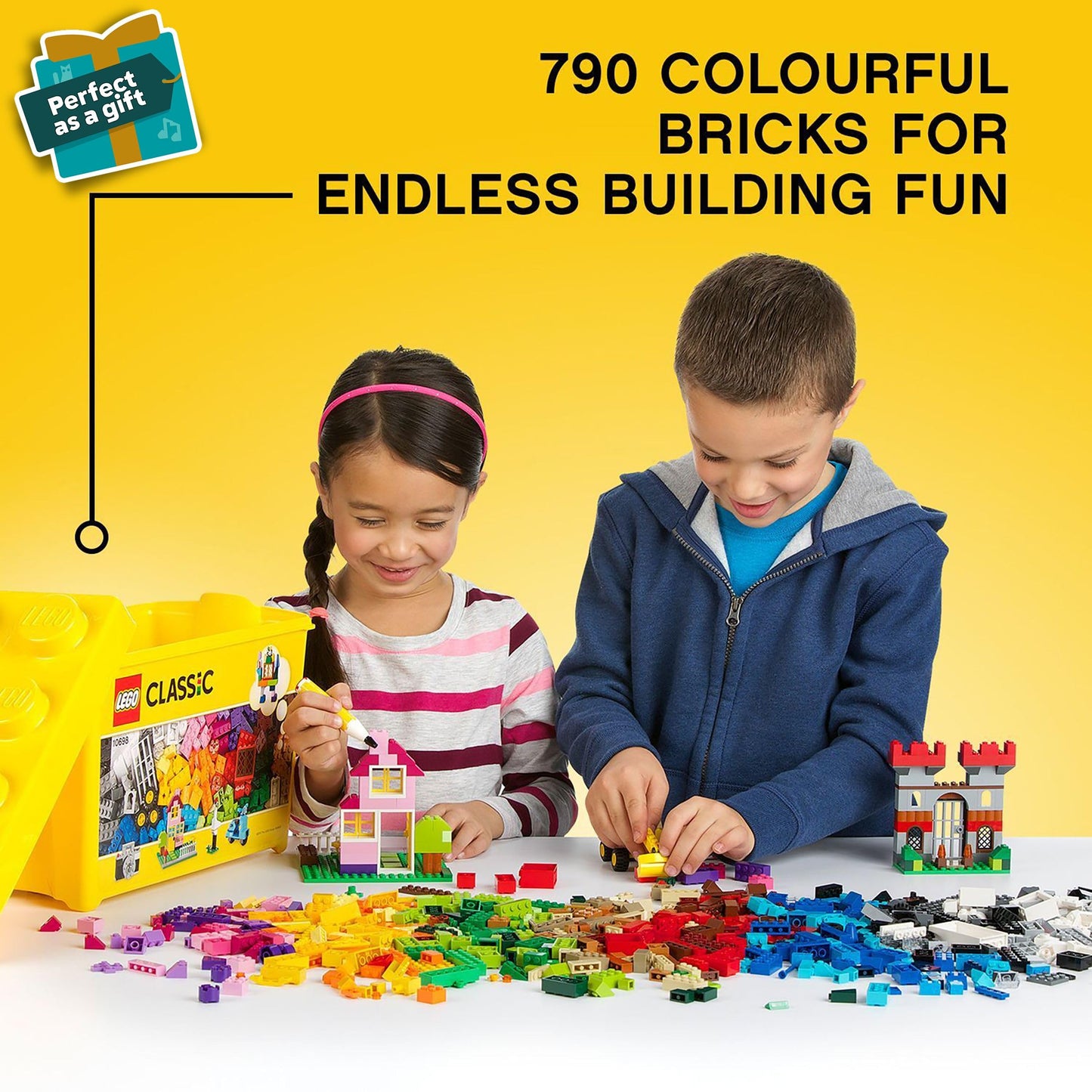 LEGO Classic Large Creative Brick Storage Box with windows, doors, wheels, and a green baseplate for educational play.