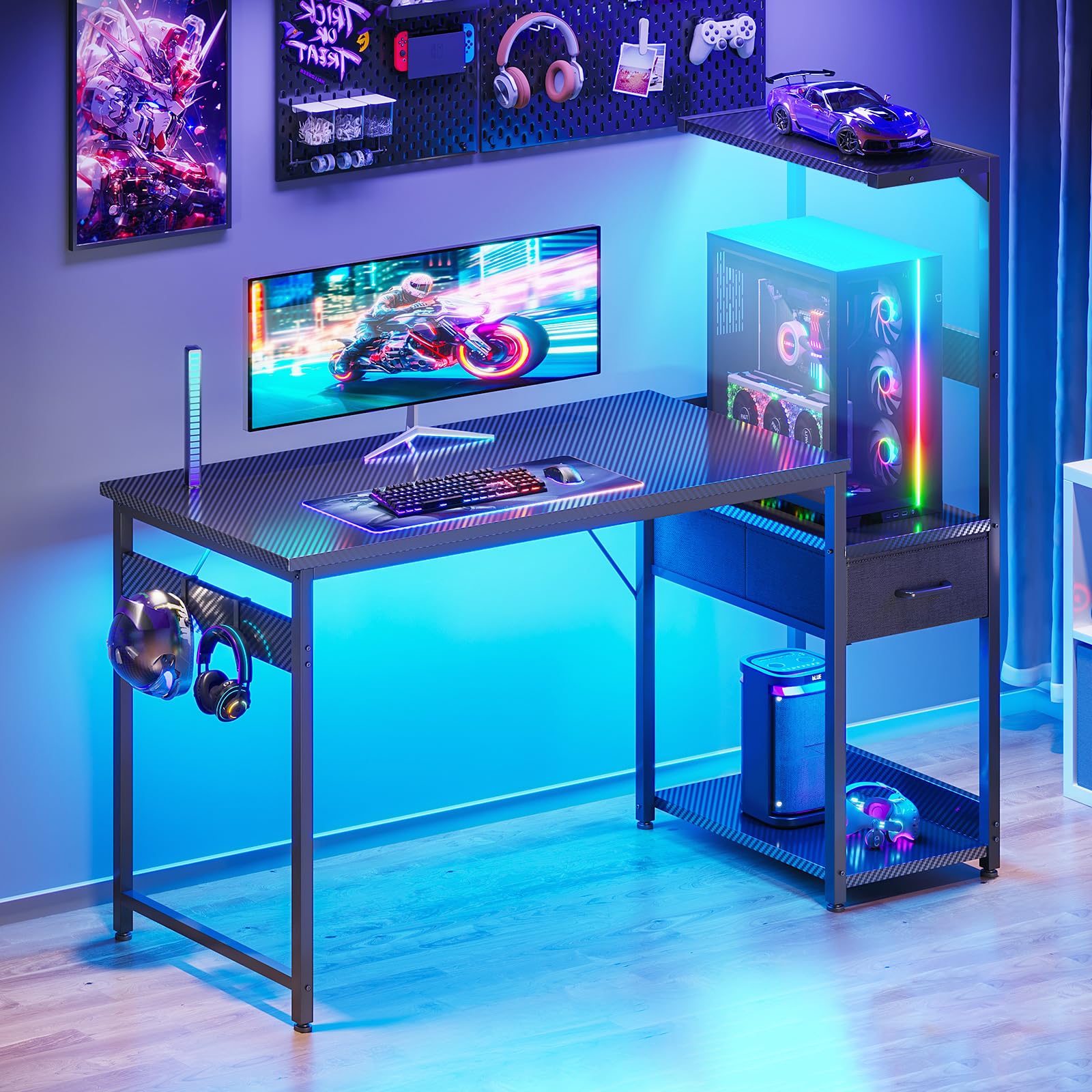 Coleshome gaming desk in black with LED lights, reversible design, drawers, display shelves, headphone hook, and carbon fiber surface.