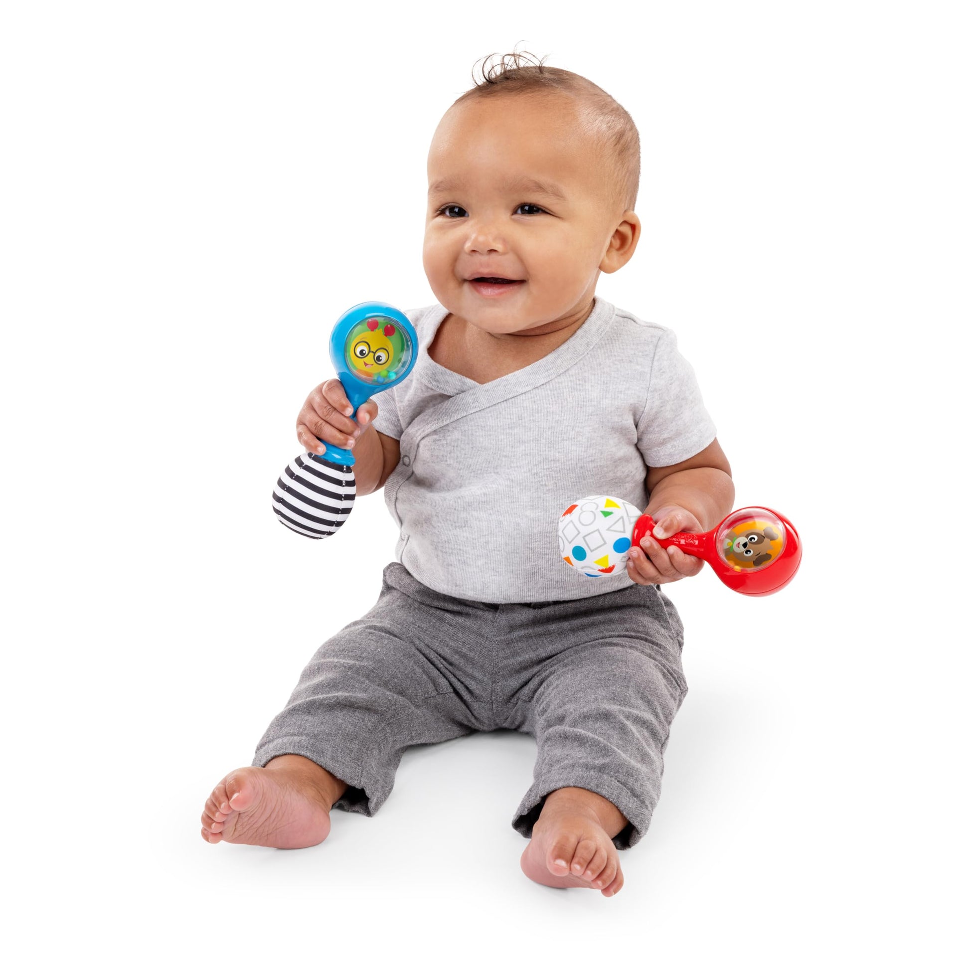 Baby Einstein Shake & Groove toy with colorful maracas, suitable for babies 3+ months, engaging musical instrument for early development.