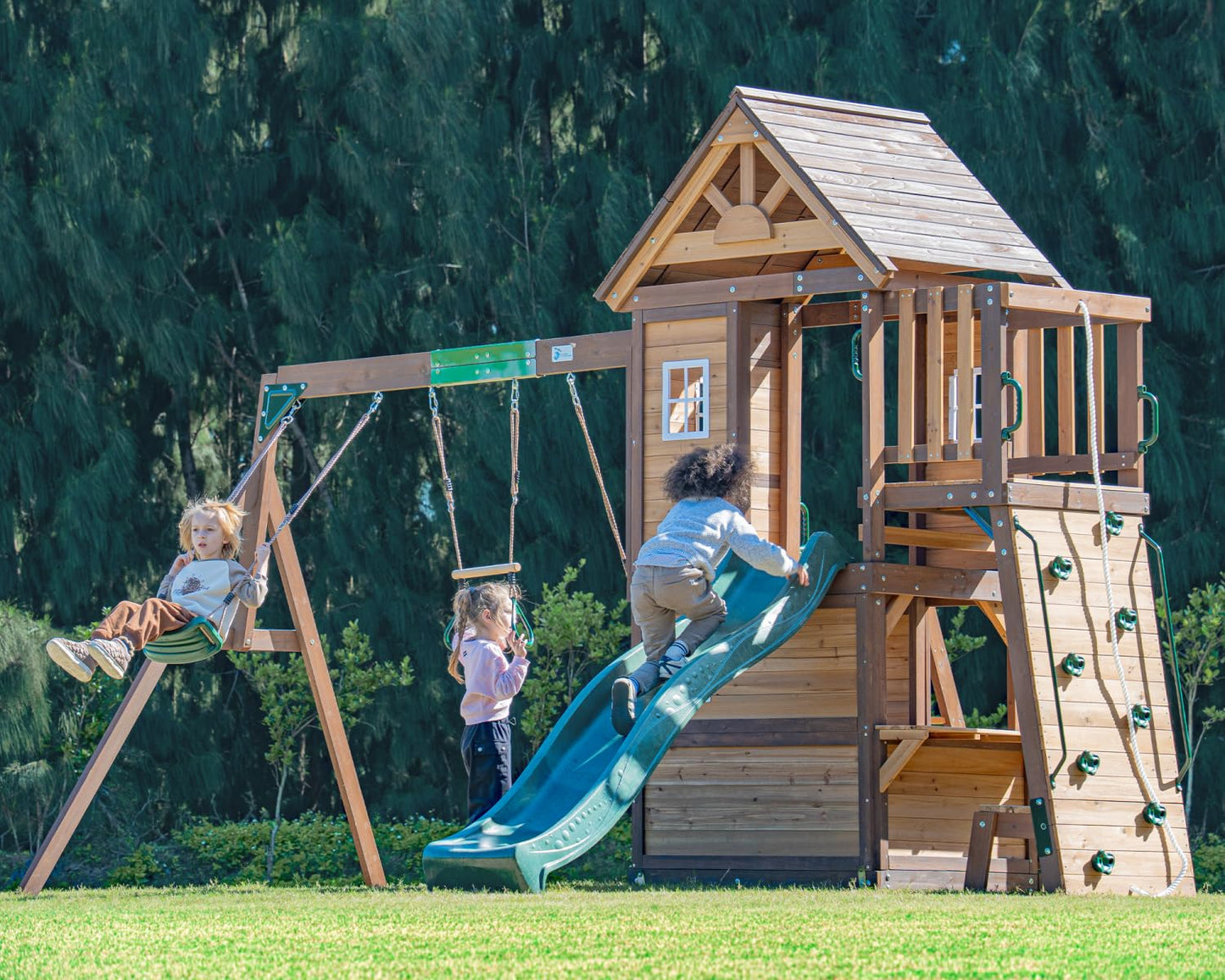 DOLPHIN PLAYGROUND T Swing Set for Backyard with Slide, 2 Swings, Trapeze Bar, Climbing Wall, Play house for Kids Outdoors with Kitchen Toys and Wooden Roof – Cedar Wood Outdoor Playset for Ages 3+