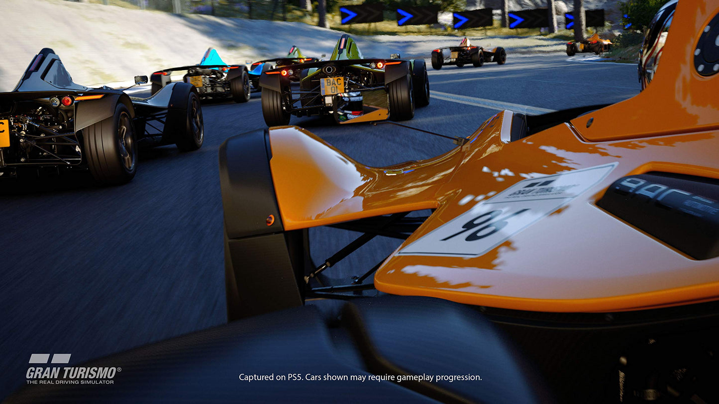 PlayStation Gran Turismo 7 Standard Edition game case for PlayStation 5, featuring racing car artwork on the cover.