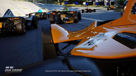 PlayStation Gran Turismo 7 Standard Edition game case for PlayStation 5, featuring racing car artwork on the cover.