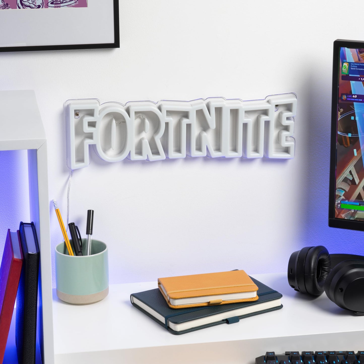 Paladone Fortnite Logo LED neon wall light with power cord, ideal for gaming decor in bedrooms or living spaces.