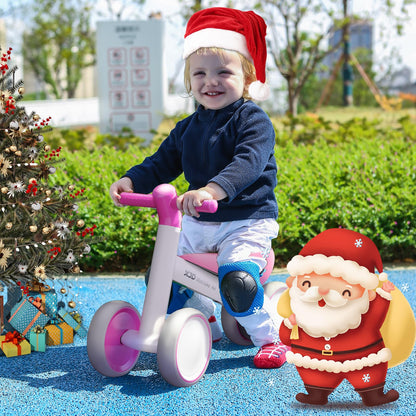 XJD pink and white baby balance bike for toddlers, designed for 10-24 months, featuring no pedals for easy riding.