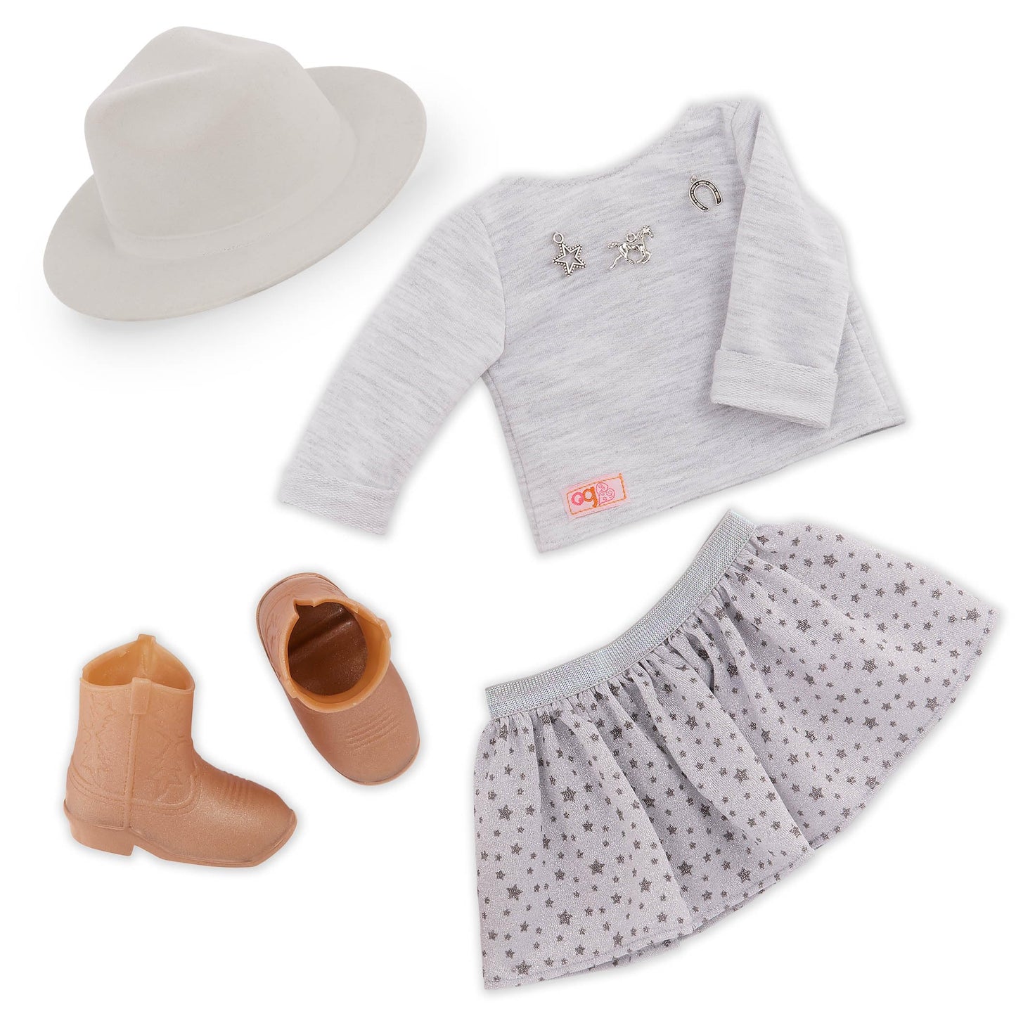 Our Generation Abigale doll with riding boots, stylish hat, and lifelike freckles in a country-themed outfit.