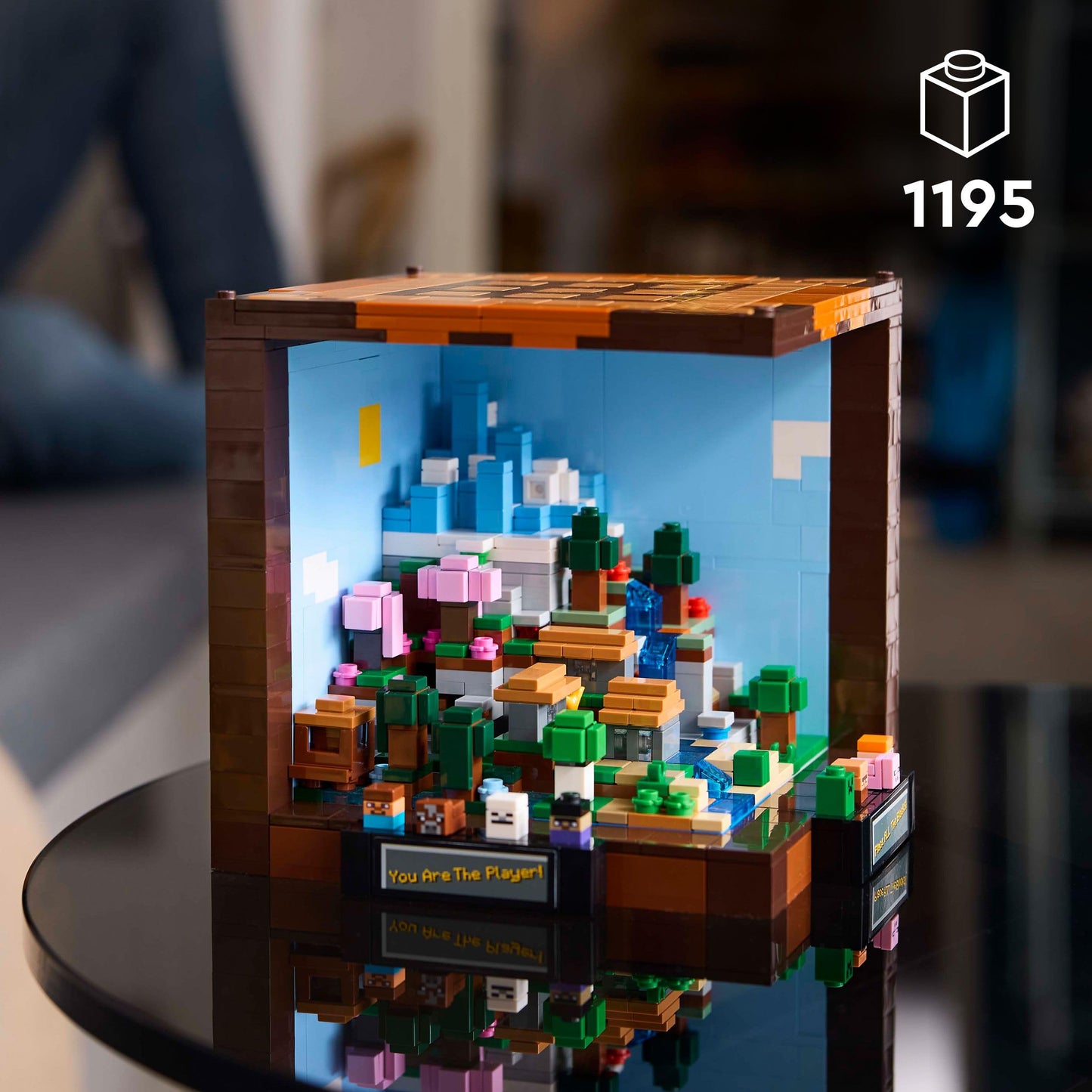 LEGO Minecraft The Crafting Table set with Steve, Alex, and mobs, showcasing a detailed DIY display model for adult fans.