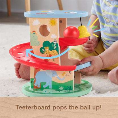 Fisher-Price Wooden Tree House Ball Run toy for babies and toddlers, includes two wooden pieces designed for infants from 9 months.