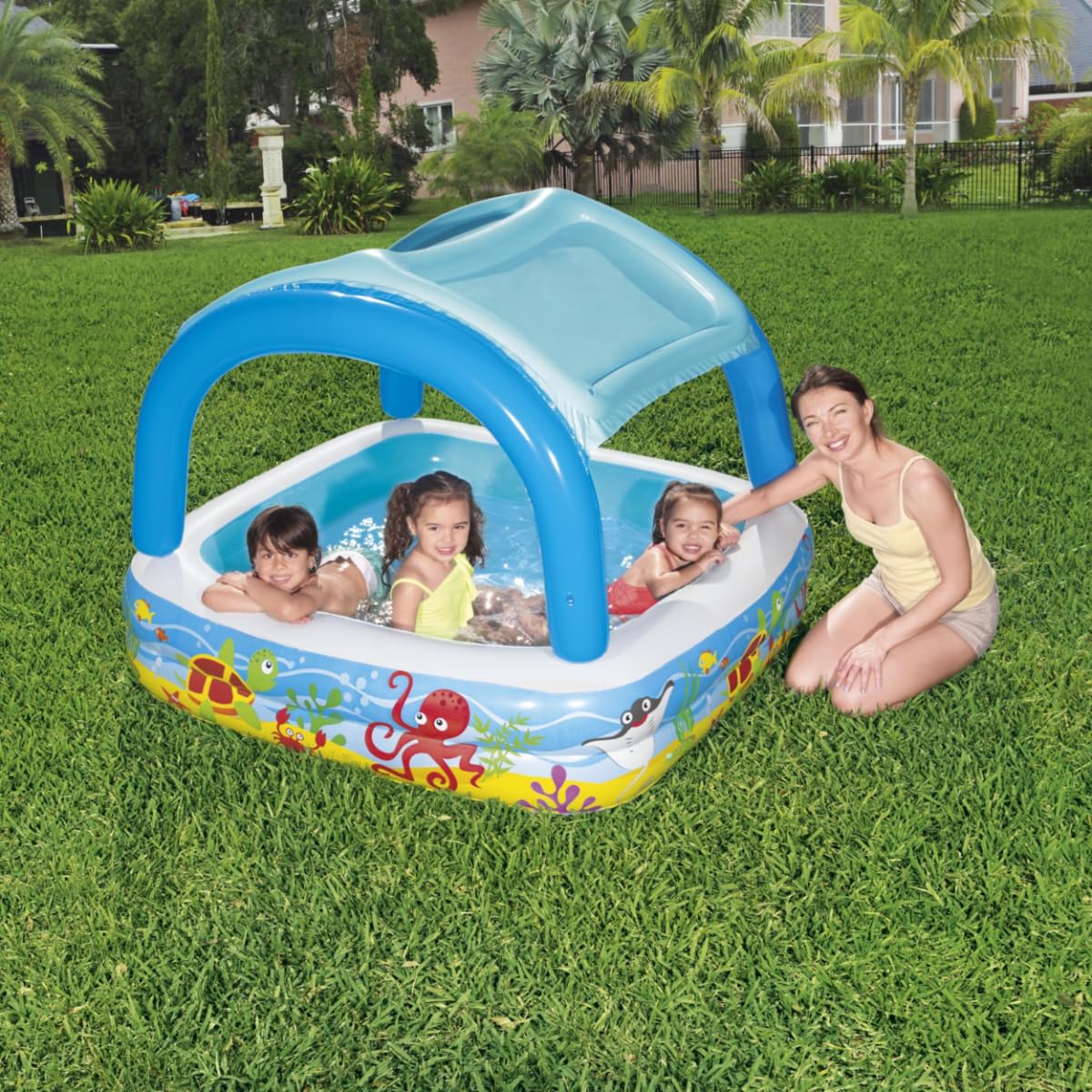 Bestway inflatable paddling pool for toddlers with shade canopy, ideal for outdoor garden play, ages 2 and up.
