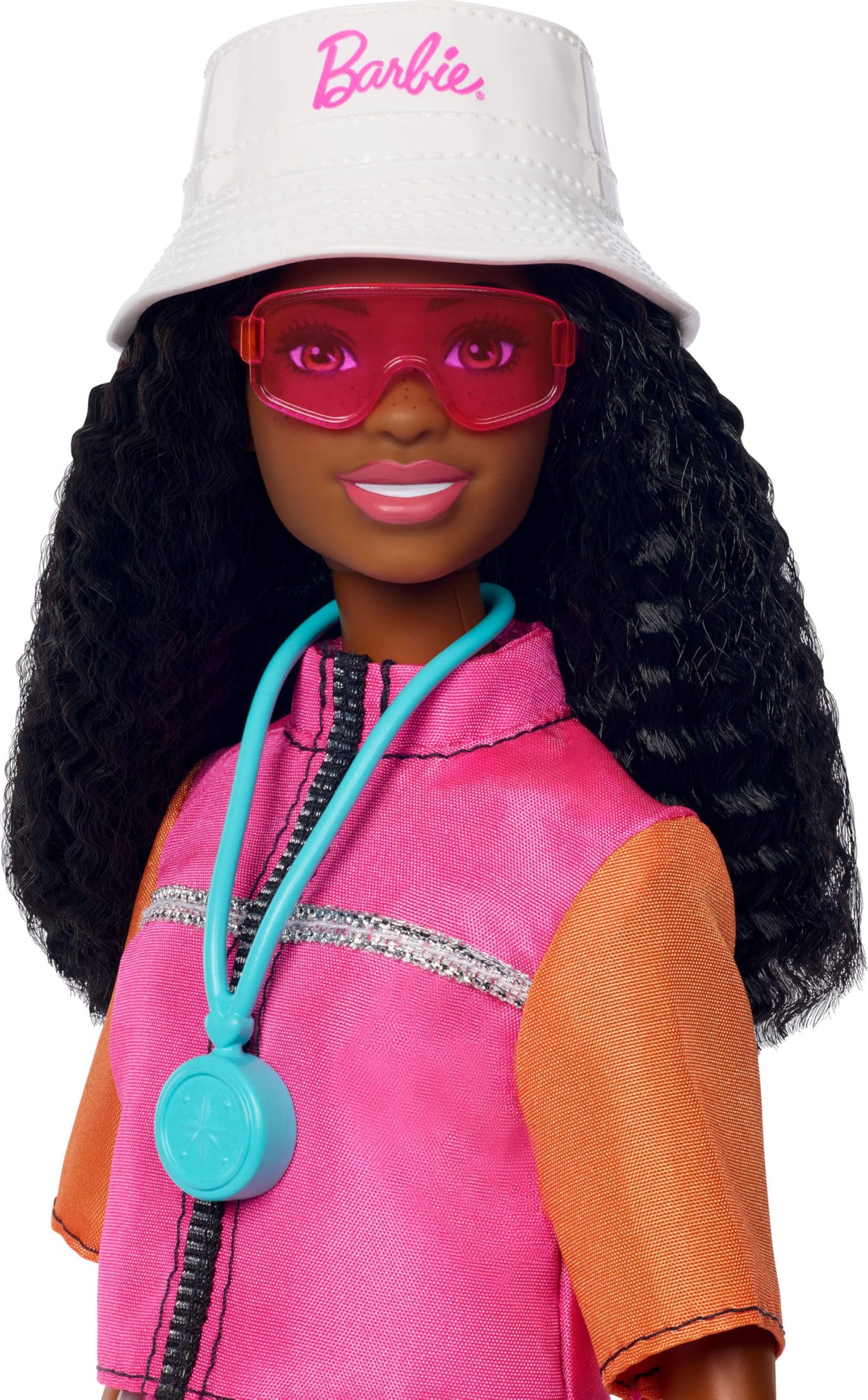 Barbie Brooklyn doll in adventure outfit with camping accessories and pet puppy, ready for outdoor fun.