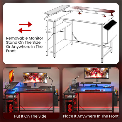 DOMSHOCT L-shaped gaming desk in carbon black with LED lights, monitor stand, storage bag, adjustable shelves, and power outlets.