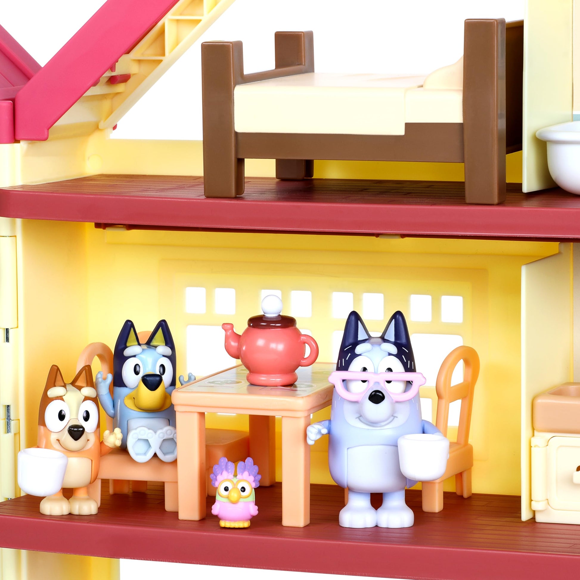 Bluey exclusive ultimate playhouse and toy box with lights, sounds, dance floor, 29 accessories, and four character figures including Bluey and Bingo.